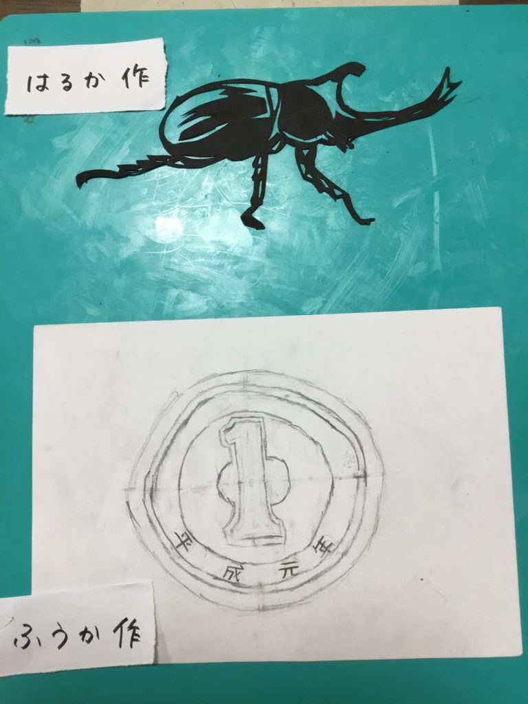 コインと切り絵