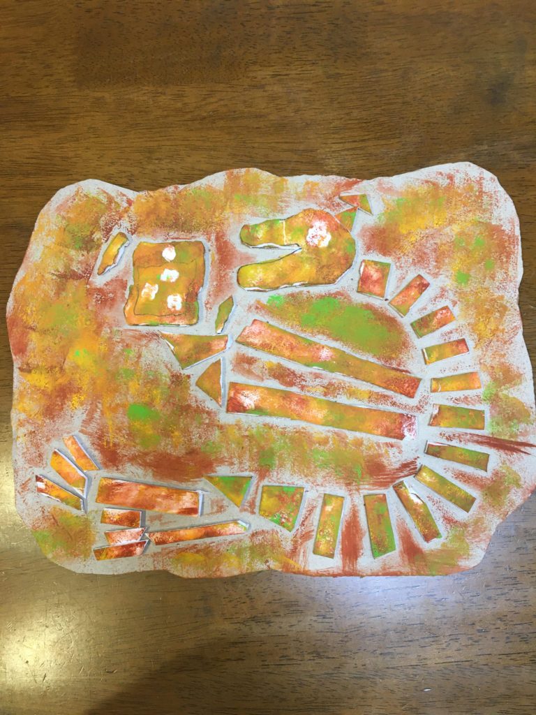 スマホと恐竜の化石