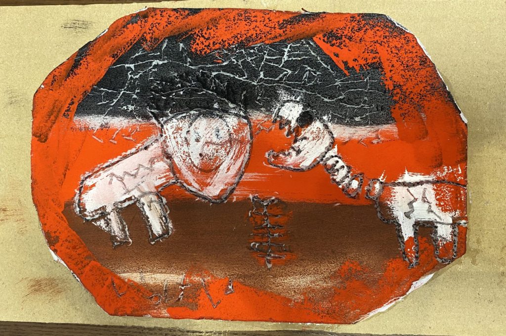 ティラノサウルスがトリケラトプスを食べようとしているところ