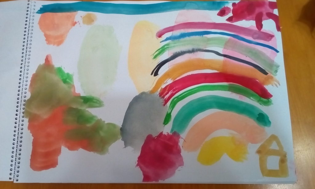 太陽と虹と木と家