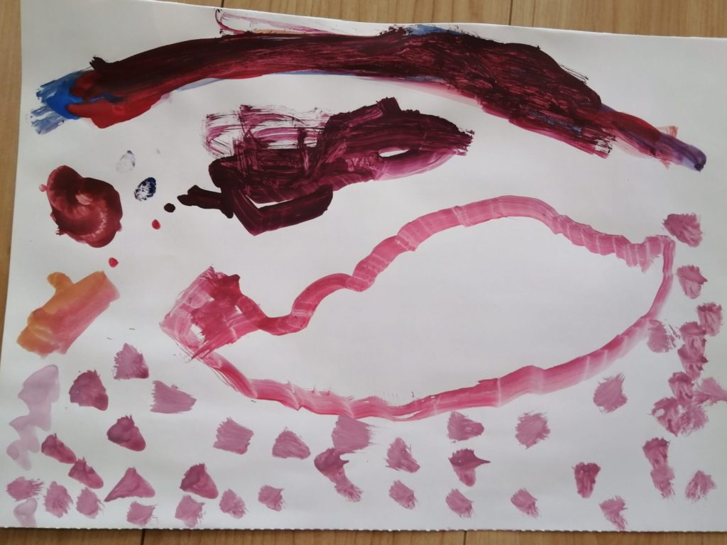 ダブルレインボーの下のジェットコースター