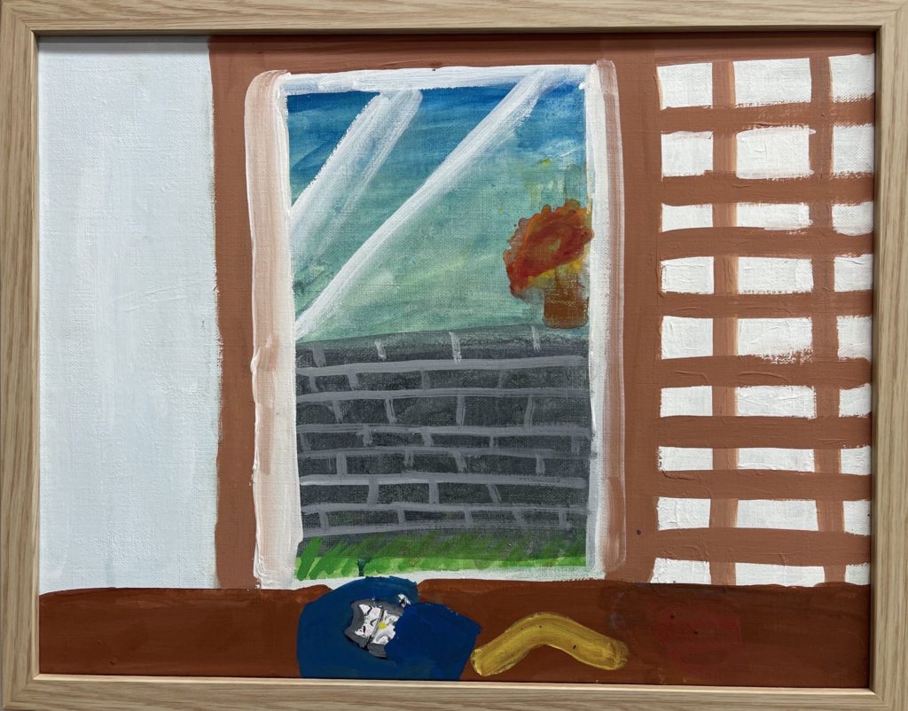 へやでねてる猫