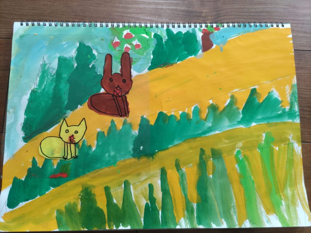 りんごをとりに行くウサギとネコ