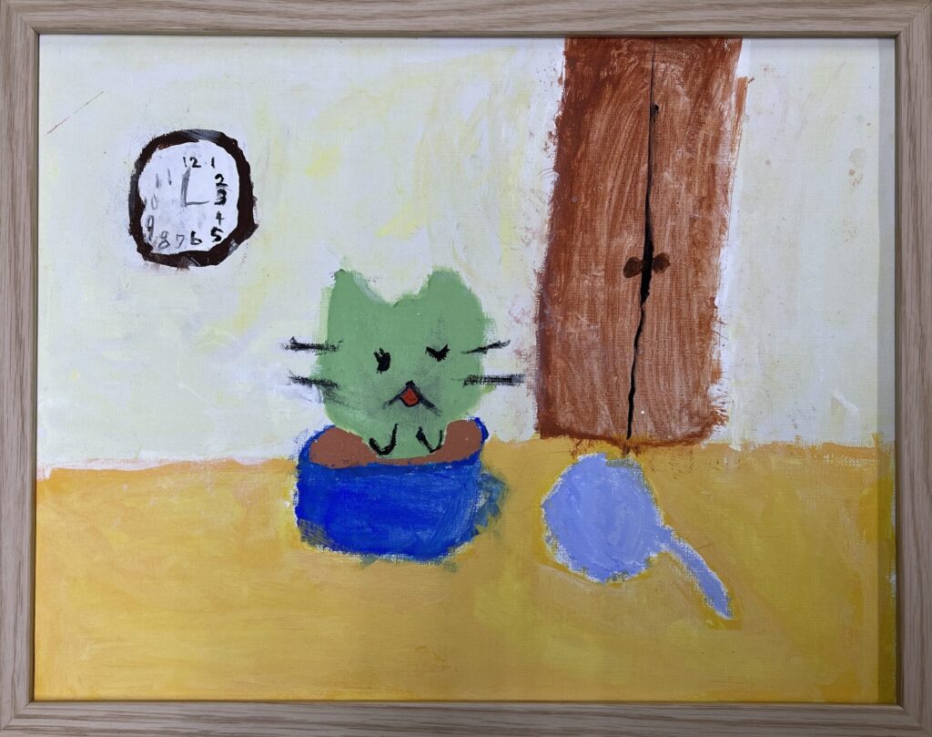 コーヒーカップの中のねこ