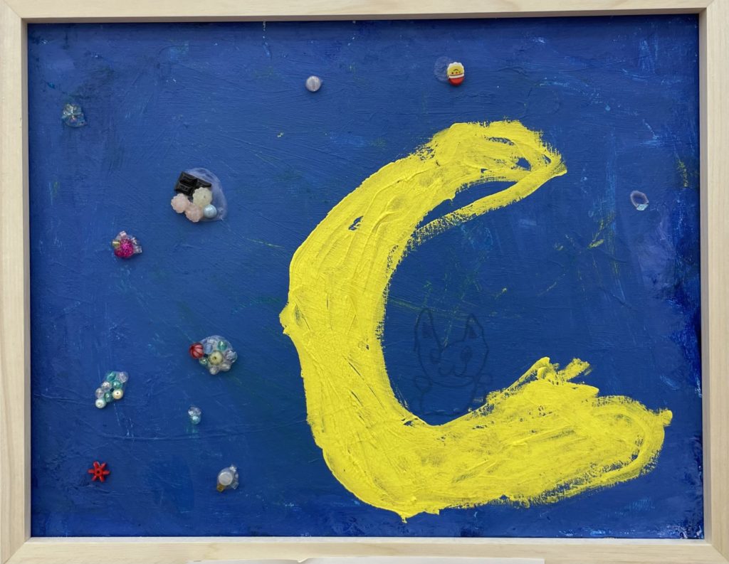 つきのところにねこがいるえをかいた